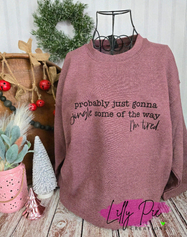 Maroon heather sweatshirt with text Probably just gonna jingle some of the way