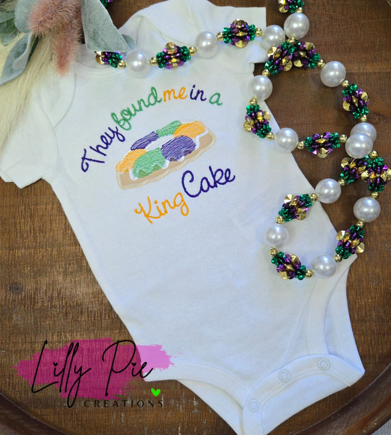 They Found me in a King Cake Baby Mardi Gras Outfit or Bib