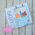 A white t-shirt with a personalized embroidery of a summer treat ice chest, including a blue cooler with colorful fruit graphics and the name 'Buds'.