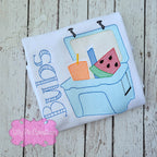 A white t-shirt with a personalized embroidery of a summer treat ice chest, including a blue cooler with colorful fruit graphics and the name 'Buds'.