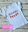 A white short-sleeved toddlers' t-shirt with red and green watermelon slices and the name 'Alexandria' embroidered on the front.