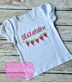 A white short-sleeved toddlers' t-shirt with red and green watermelon slices and the name 'Alexandria' embroidered on the front.